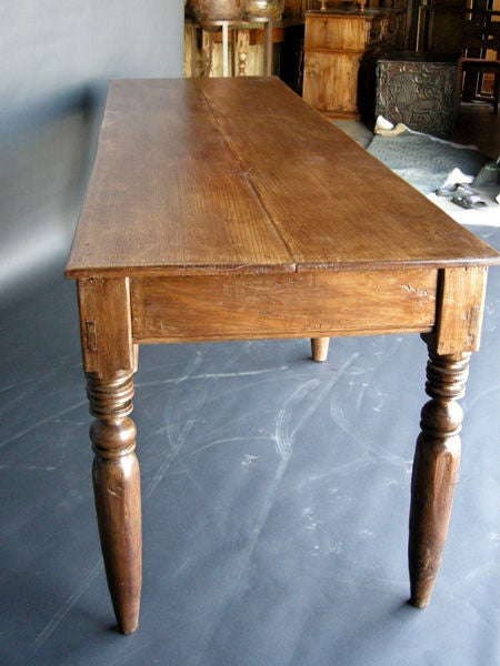 Antique cedro wood table with six legs and a two wide plank top. Great patina