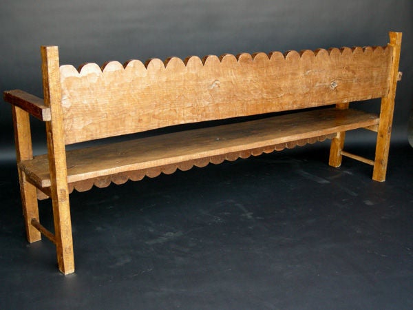 Great looking rustic bench with scalloped back and front apron.