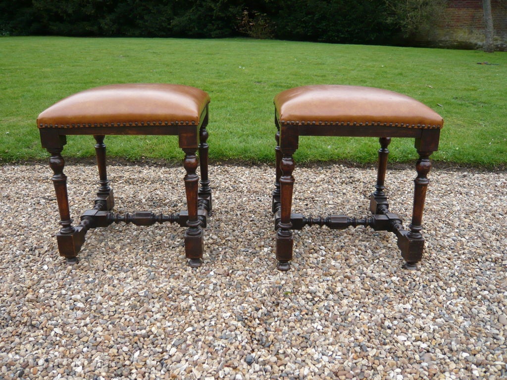 A Pair of 19th c. Italian Carved Walnut Stools