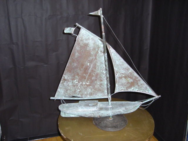 1920s full bodied copper weathervane in the form of a gaff-rigged sailing vessel.