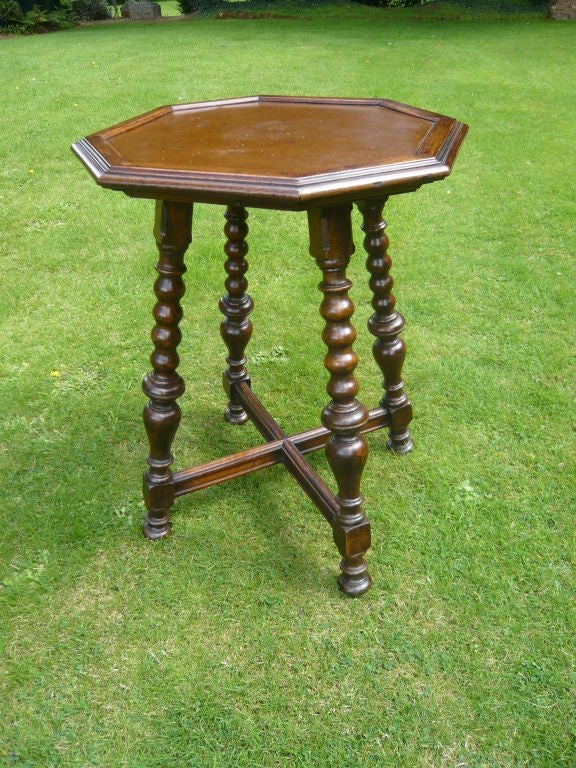 An Early 20th c. Leather Top Octagonal Table
