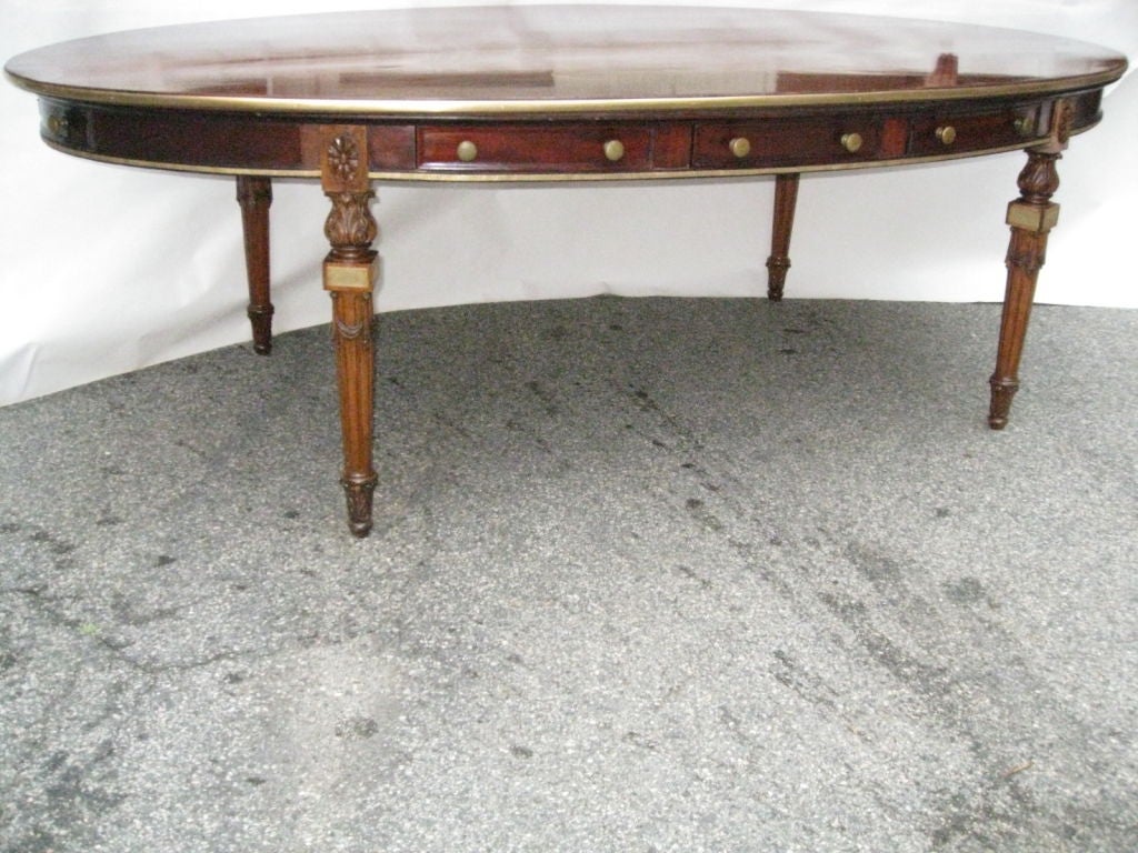 Unusual brass-inlaid oval library table In Excellent Condition In New York, NY