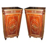 A pair neo-classical brass-inlaid mahogany cabinets