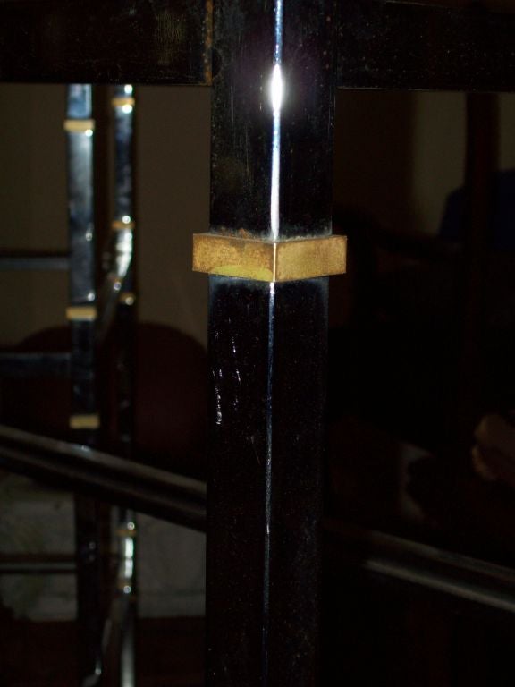 A pair of chrome and gilt-iron etageres with 6 shelves