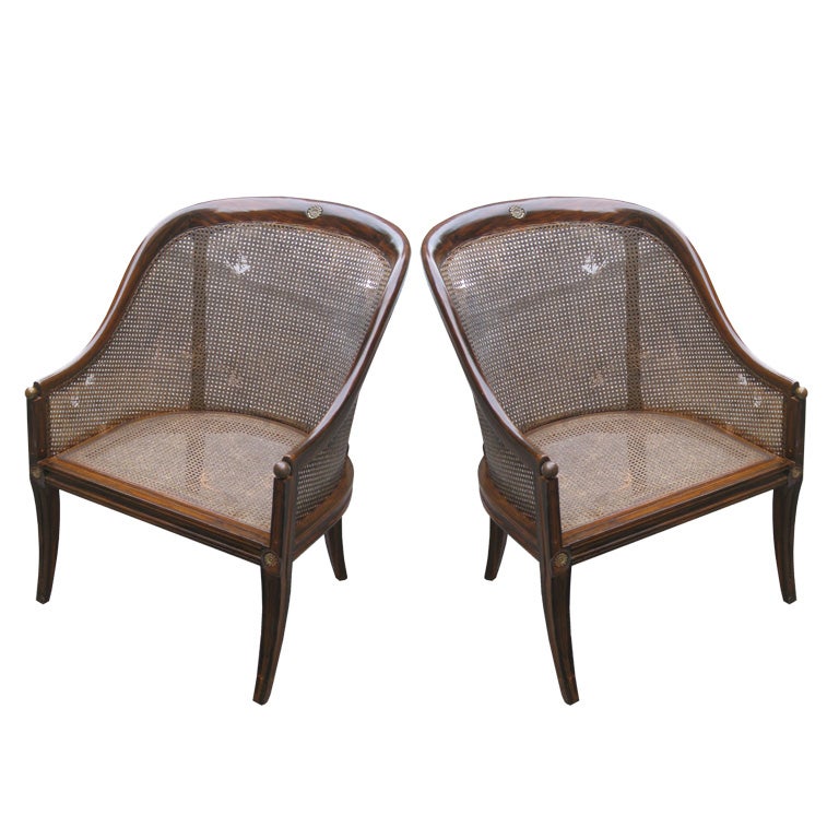 A great pair of faux-rosewood and caned spoonback chairs