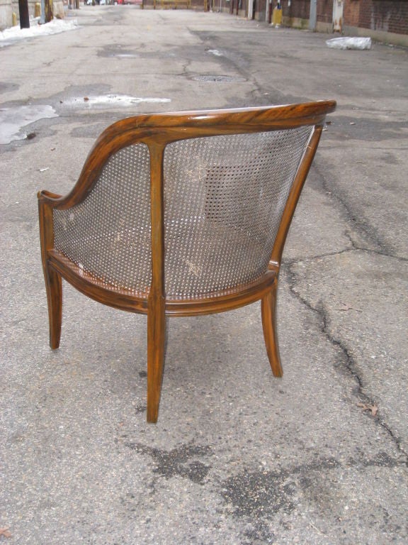 20th Century A great pair of faux-rosewood and caned spoonback chairs