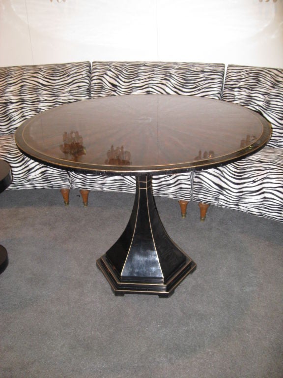 Neoclassic Style Rosewood brass-banded table on pedestal base