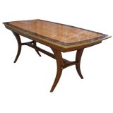 Stylized mid-century, brass-inlaid table on cabriole legs