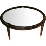 ebonized circular coffee table with smoked mirrored top