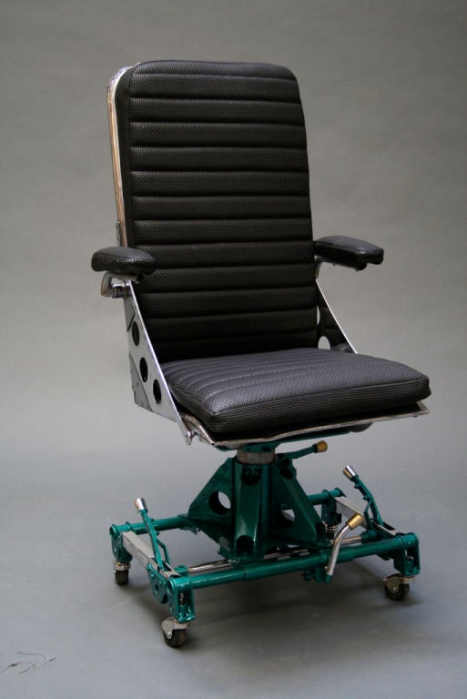 Handsome helicopter seats (probably Vietnam War era), restored, with wheels attached allowing use as desk chairs. Offered individually.