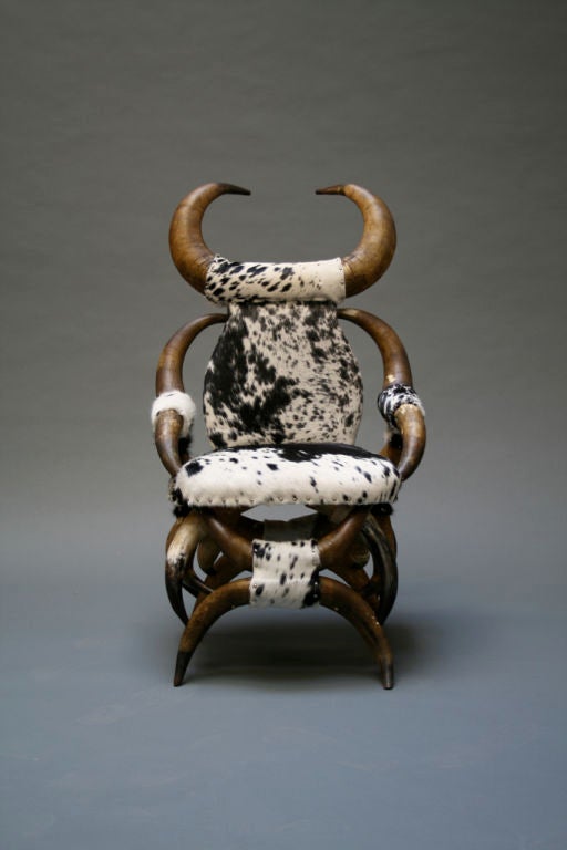 Ornate and complicated chair made of steer horns. Functional art, baby.