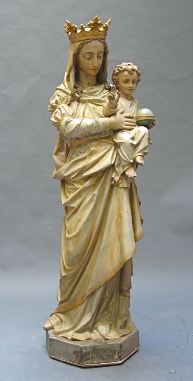 Terra-cotta, gesso and paint is the technique on this near life size, all original beauty. Great patina!
