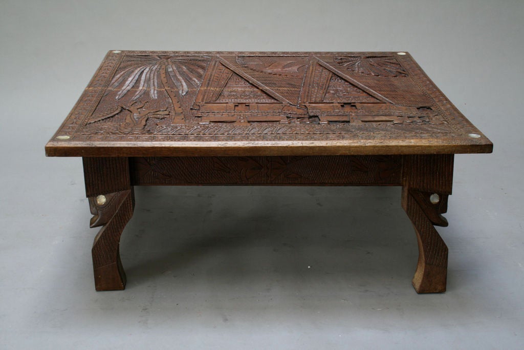 From the estate of a wealthly world traveler, made from very heavy (think ebony) tropical hardwood. Top spins tale of the exciting exploits of local deities.