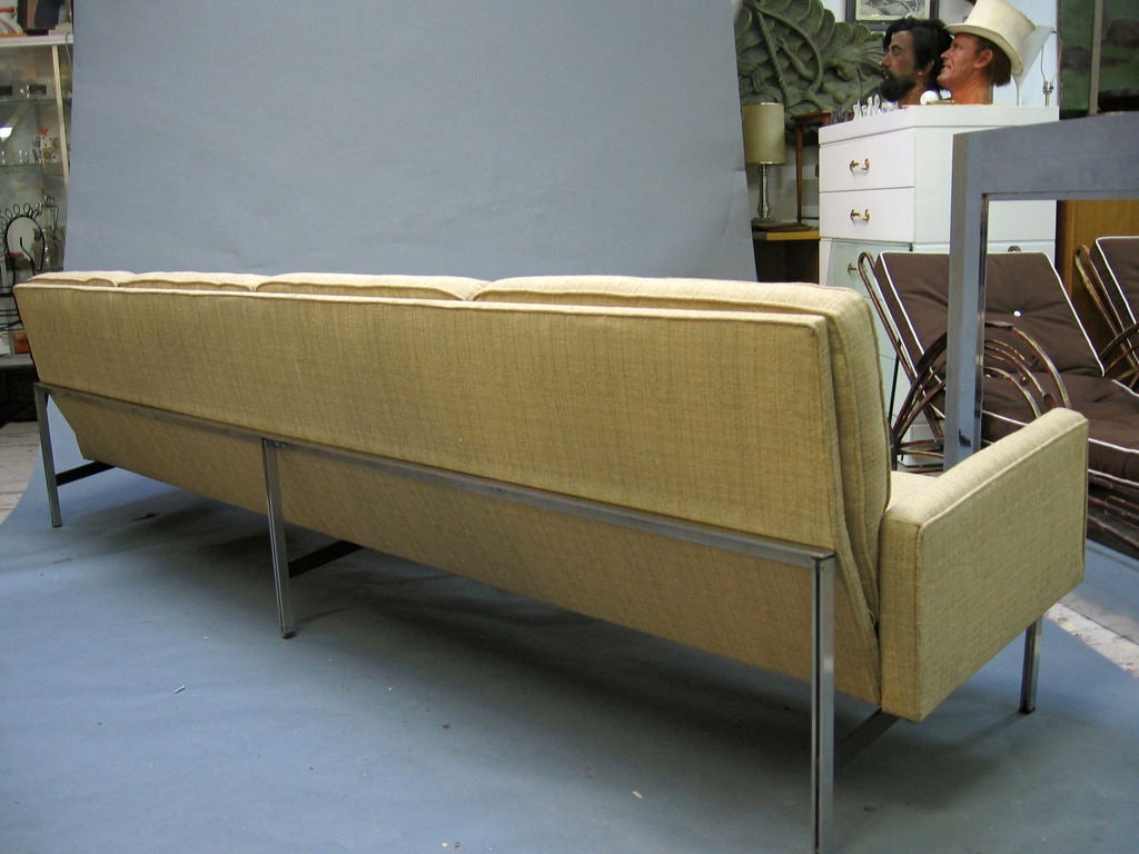This one is family size. This super long sofa features  new upholstery.