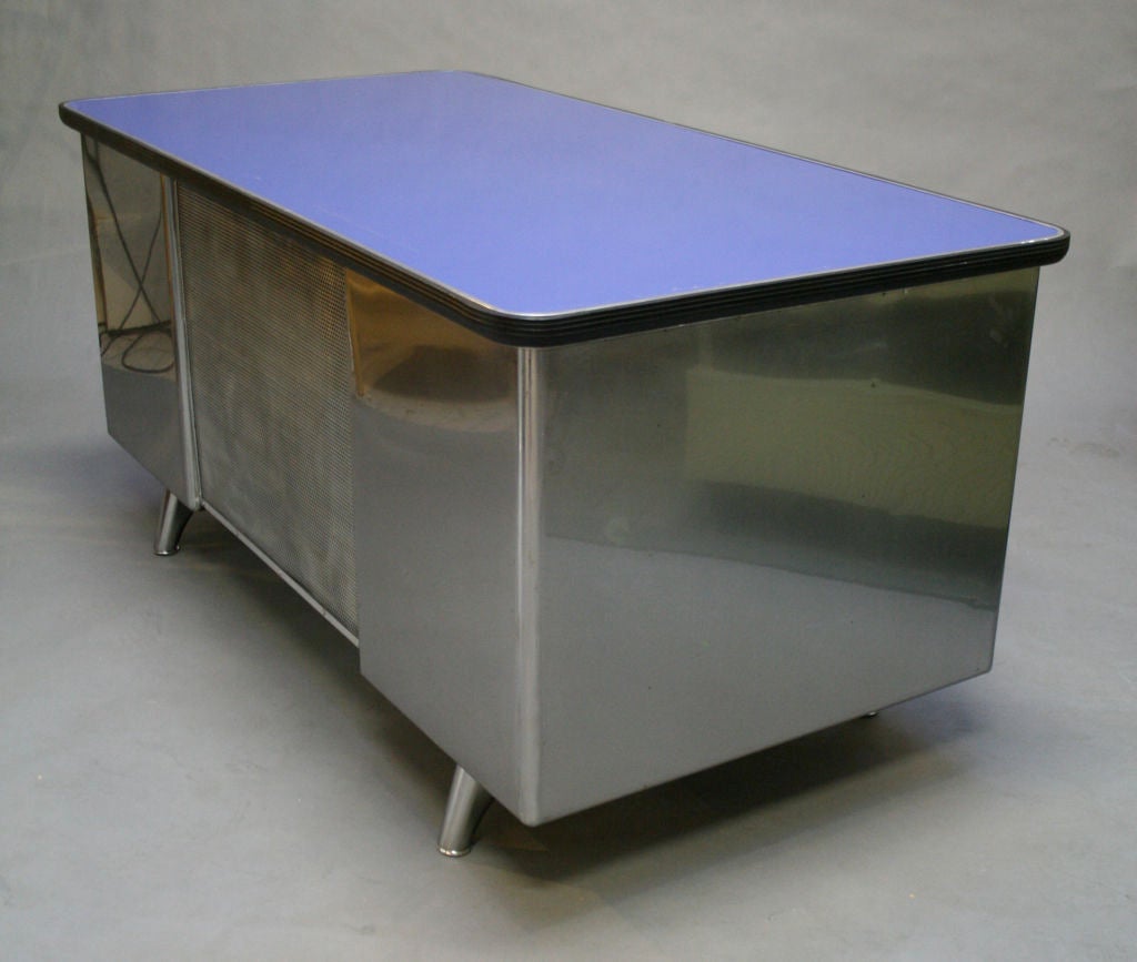 Classic steel tanker desk.  Features deco styling.  Customizable surface color or material. Visit: http://abetlaminati.com/Products.aspx?c=3&s=43 for color samples