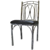 Single Polished Cast Aluminum chair by Arthur Court Single Polished Cast Aluminum chair by Arthur Court