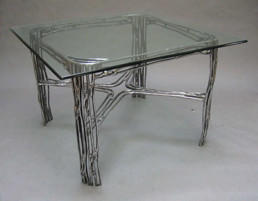 San Francisco's Arthur Court designed and manufactured this series in 1974, inspired by dried saguaro cactus skeleton. Molds for all of Court's cast furniture were destroyed in 1980.