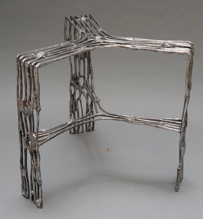 San Francisco's Arthur Court designed and manufactured this series in 1974, inspired by dried saguaro cactus skeleton. Molds for all of Court's cast furniture were destroyed in 1980.