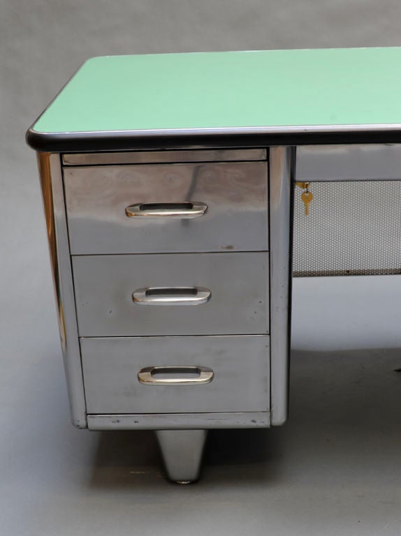 Classic steel tanker desk. Features deco styling.
