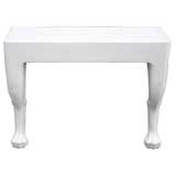 A White resin wall console in the style of John Dickinson