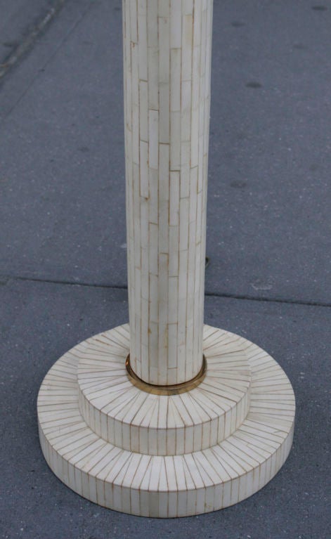 Bone veneered floor lamp in cylindrical form with round stepped base and brass details.<br />
<br />
Comes with original receipt from the Karl Springer showroom.