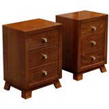 A pair of satinwood bedside tables by James Mont