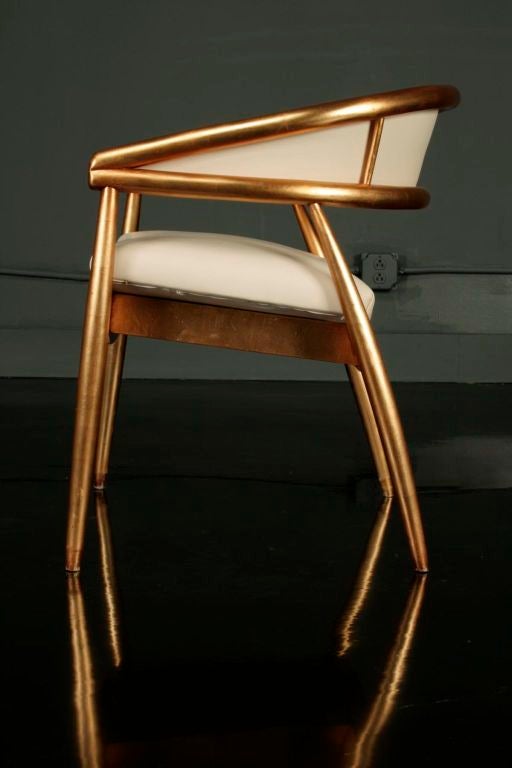 Magnificently designed, Chinese inspired chairs with circular bent wood backs and legs, each finished in antiqued gold metal leaf over a terracotta base.  <br />
New York, 1963       <br />
<br />
Provenance:<br />
Ellis Orlowitz, King Cole