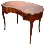 A Louis XV Style Ormolu Mounted Tulipwood and Marquetry Desk