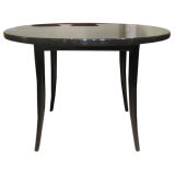 A Classic H.Probber Sabre Leg round Dining Table