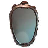 A Large Mirror by Decorative Arts