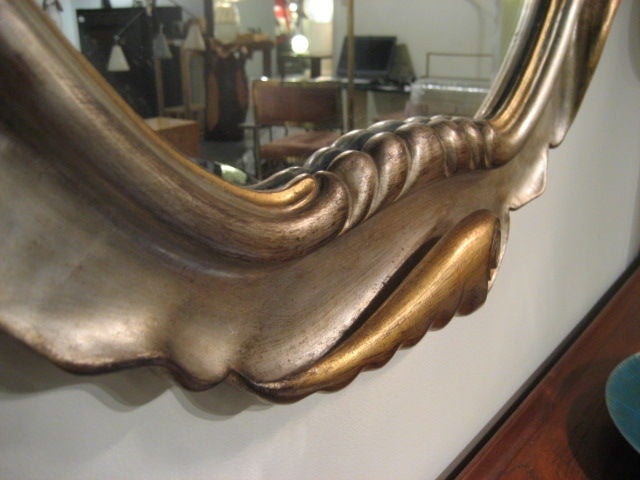 A Large Mirror by Decorative Arts