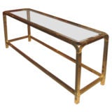 A Console Table in Polished Brass by Mastercraft