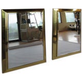A Pair of Decorative Polished Brass Mirrors by LaBarge