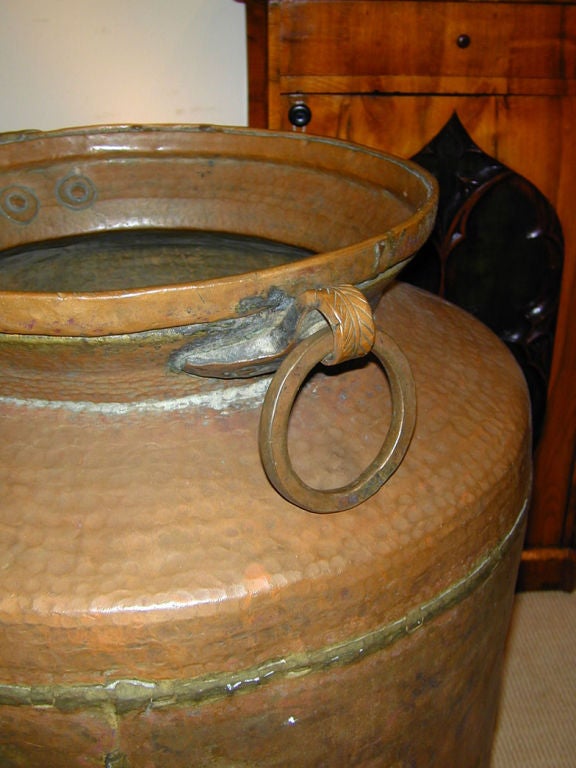 large copper urn