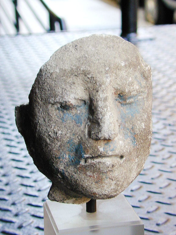 Mayan stucco head of a nobleman with traces of the original blue paint. Late classic period circa 500-90 AD.