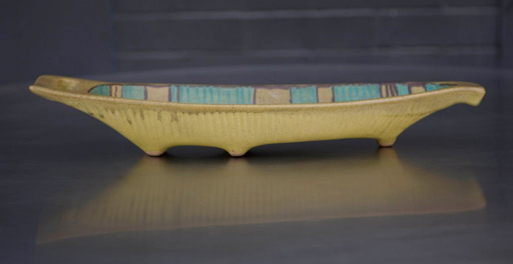 A ceramic boat form tray by Fong Chow for Glidden, Alfred, NY. U.S.A., circa 1950.