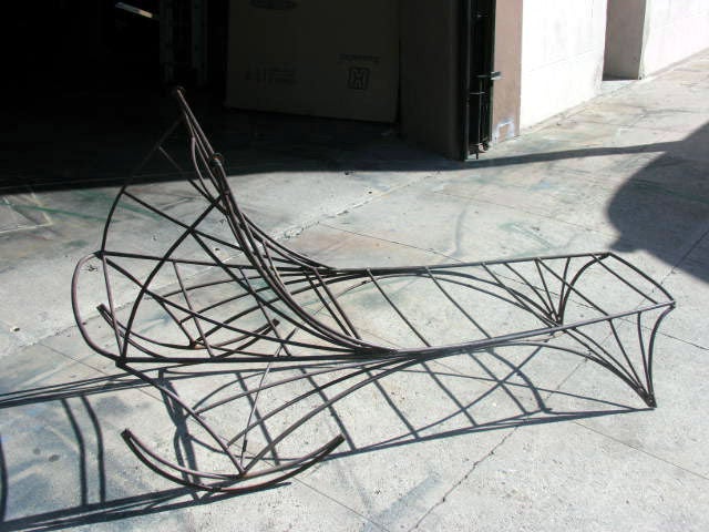 Wrought iron lounge chair designed by American artist Allen Ditson.