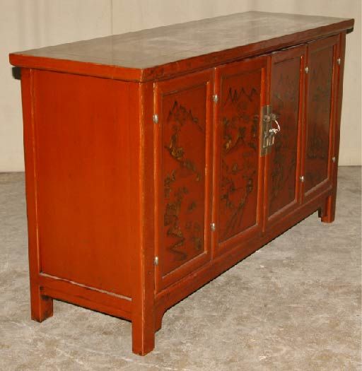 An elegant red lacquer sideboard with fine hand-painted gold gilt landscape motif on a pair of bifold doors, brass fitting, beautiful color, form and lines.  We carry fine quality furniture with elegant finished and has been appeared many times in 