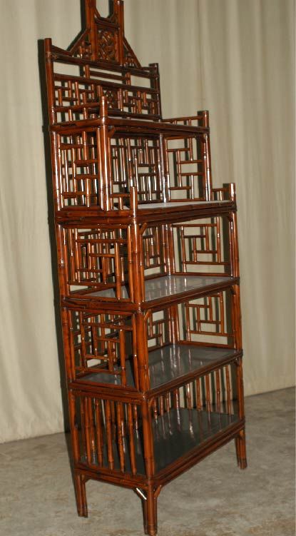 A refined and elegant bamboo display / book case with black lacquer shelves, lattice fret work. beautiful colors, form and lines.
 We carry fine quality furniture with elegant finished and has been appeared many times in 