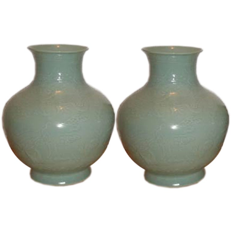 A Pair Of Porcelain Vases With Under Glaze Dragon Motif