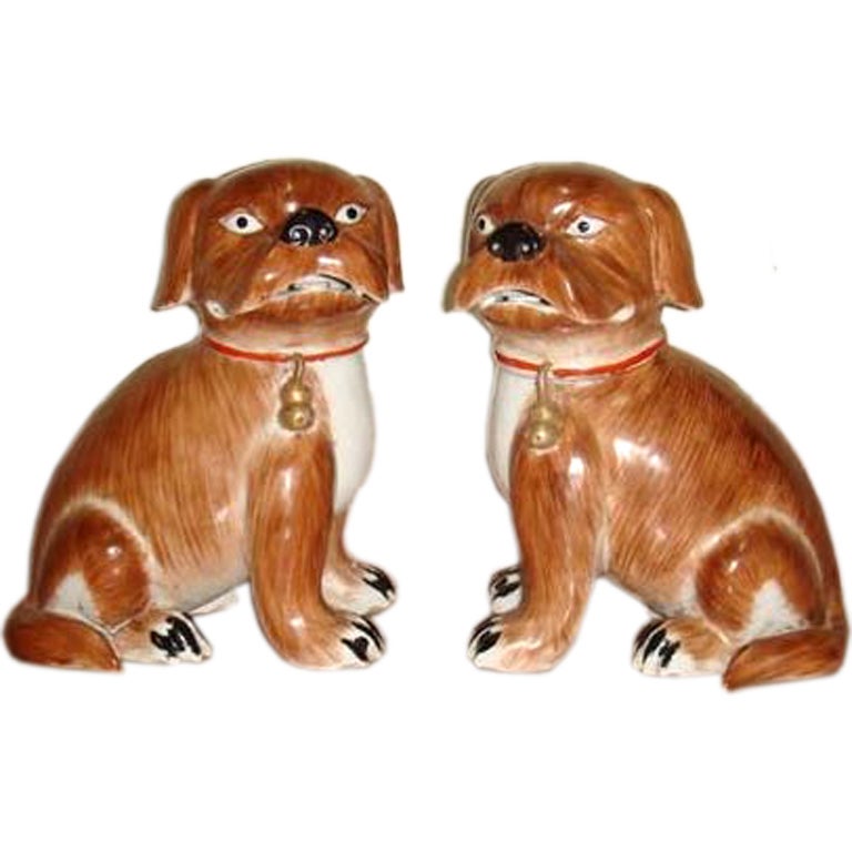 A Pair Of Porcelain Dogs