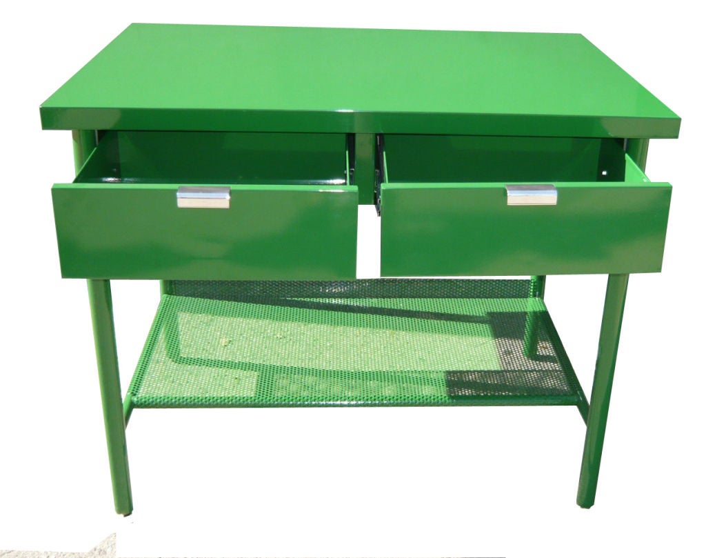 Mn Originals custom steel work table in high gloss powder coated finish. Steel construction finished in any custom color with custom sizing available. Perforated metal lower shelf with pull out drawers. Polished aluminum hardware.

Custom orders