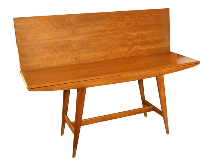 Rare Gio Ponti for Singer and Sons Flip Top Walnut dining table ca. 1960. Italian Walnut construction with Brass sabots.Table can be used for a 19