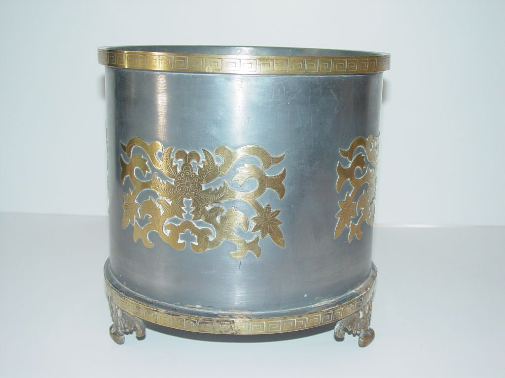 Attractive/Decorative-early Gumps of San Fransisco planter.Pewter and brass relief,with figural bat form feet,some interior corrosion from water commensurate to age.