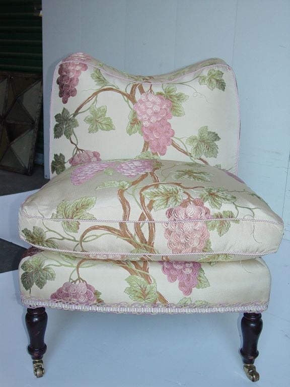 A Charming/Romantic American Tete-A-Tete.Six mahogany legs on brass casters,down filled  spacious cushions on seats and back rests.Grapes and leaves in relief on Cowtan & Tout fabric.