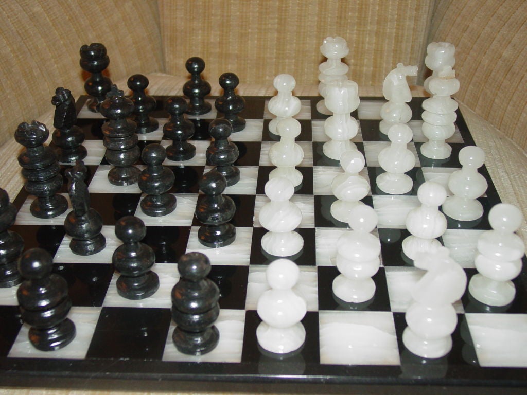 An Elegant black and white Onyx Chess set,in excellant condition,all pieces intact.