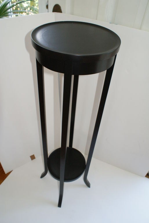 Sleek Pair of Tall Ebonized Stands
