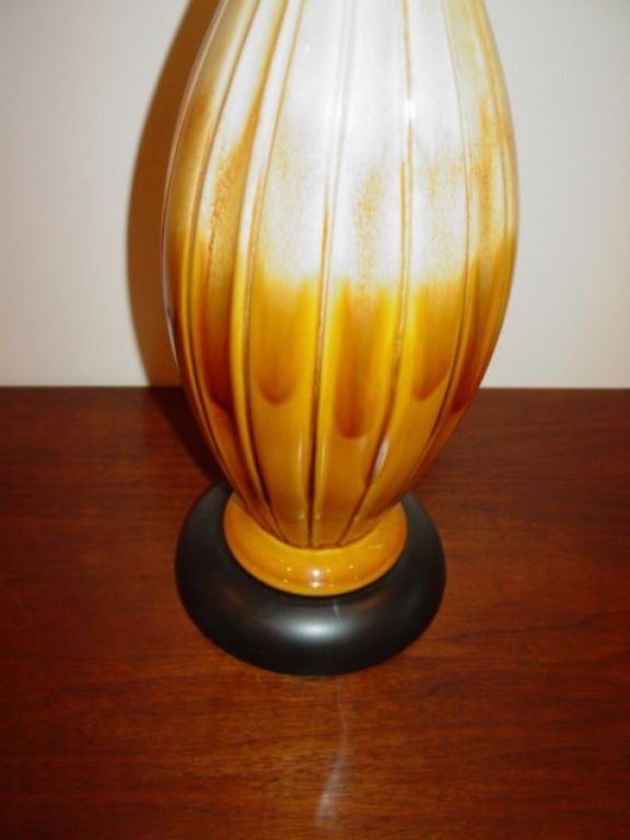Pair of pottery lamps by Haeger in browns and mustard gold tones,hand brushed.White or black shades available..