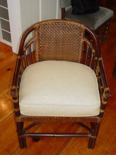 Great pair of Rattan & Bamboo Plantation chairs.They have six legs supporting a very genorous seat, lots of detail and bamboo strapping.Rattan seat and backs.