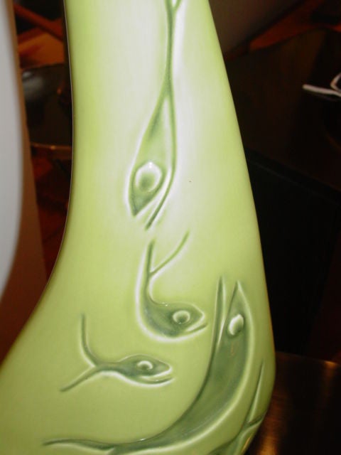 Playful tall green ceramic Haeger Lamp.With small and large fish on both sides (relief) New fittings 75 watts.